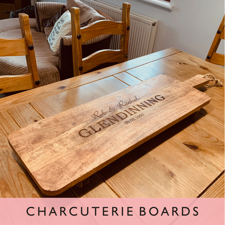 A selection of personalised charcuterie boards from GQGifts