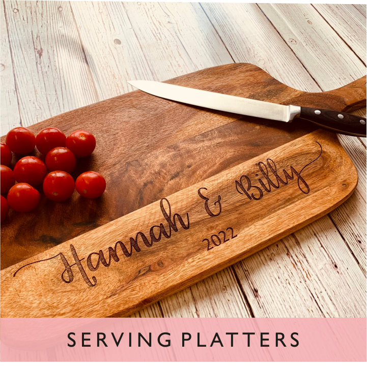 A selection of personalised serving platters from GQGifts